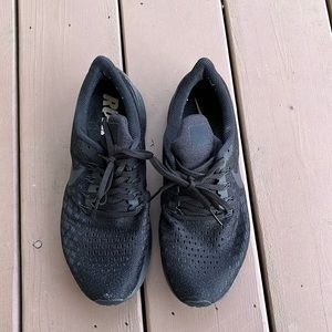 Black Nike running shoes